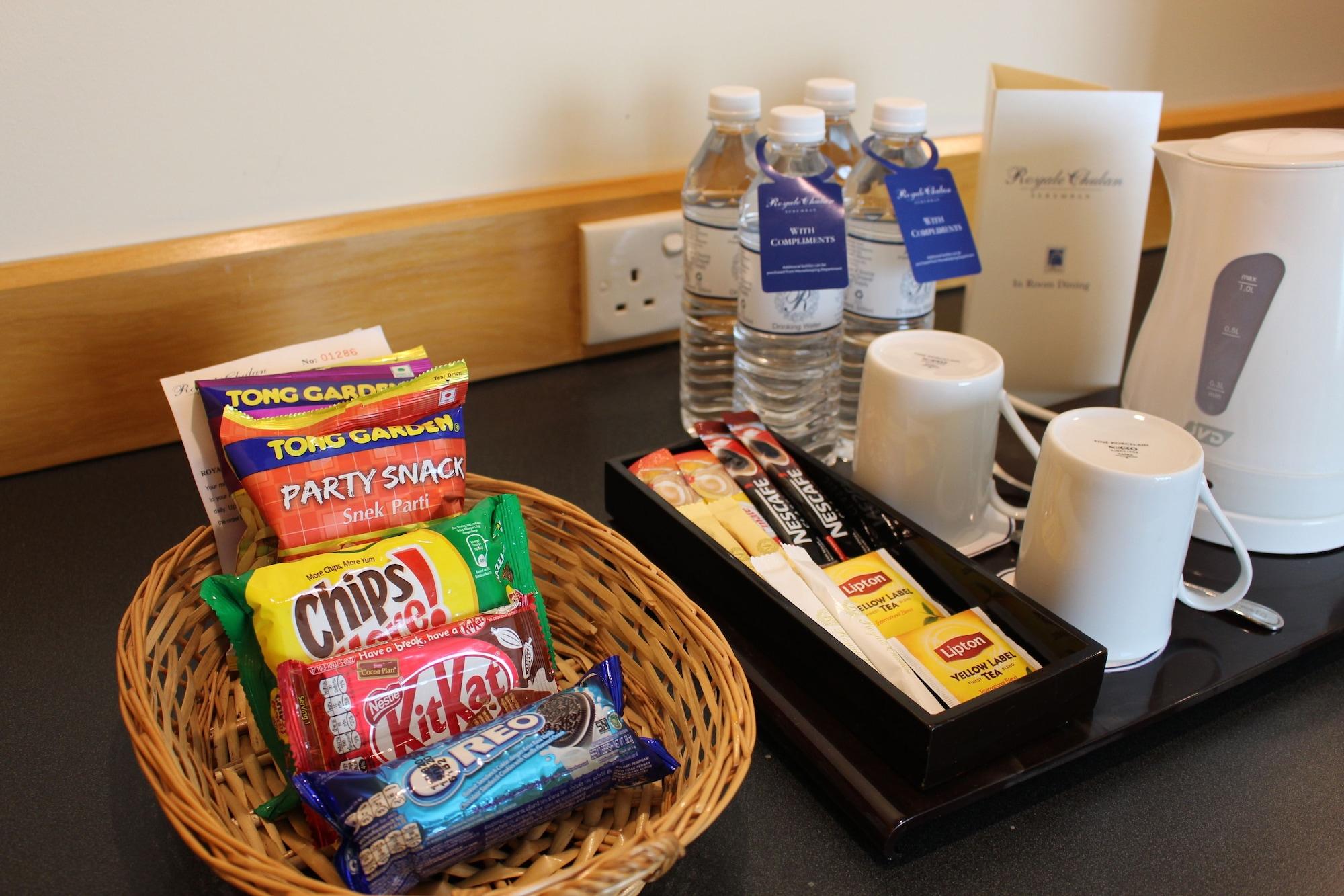 Royale Chulan Seremban Eksteriør billede A selection of snacks and bottled water in a hotel room